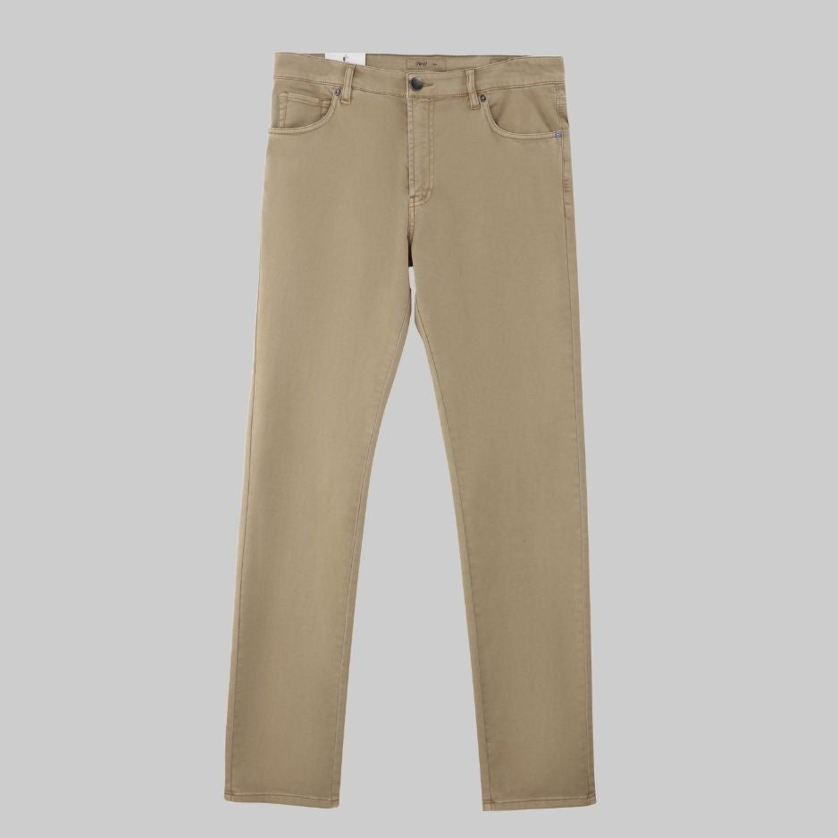 Wheat colored five pocket pants laid flat on neutral background