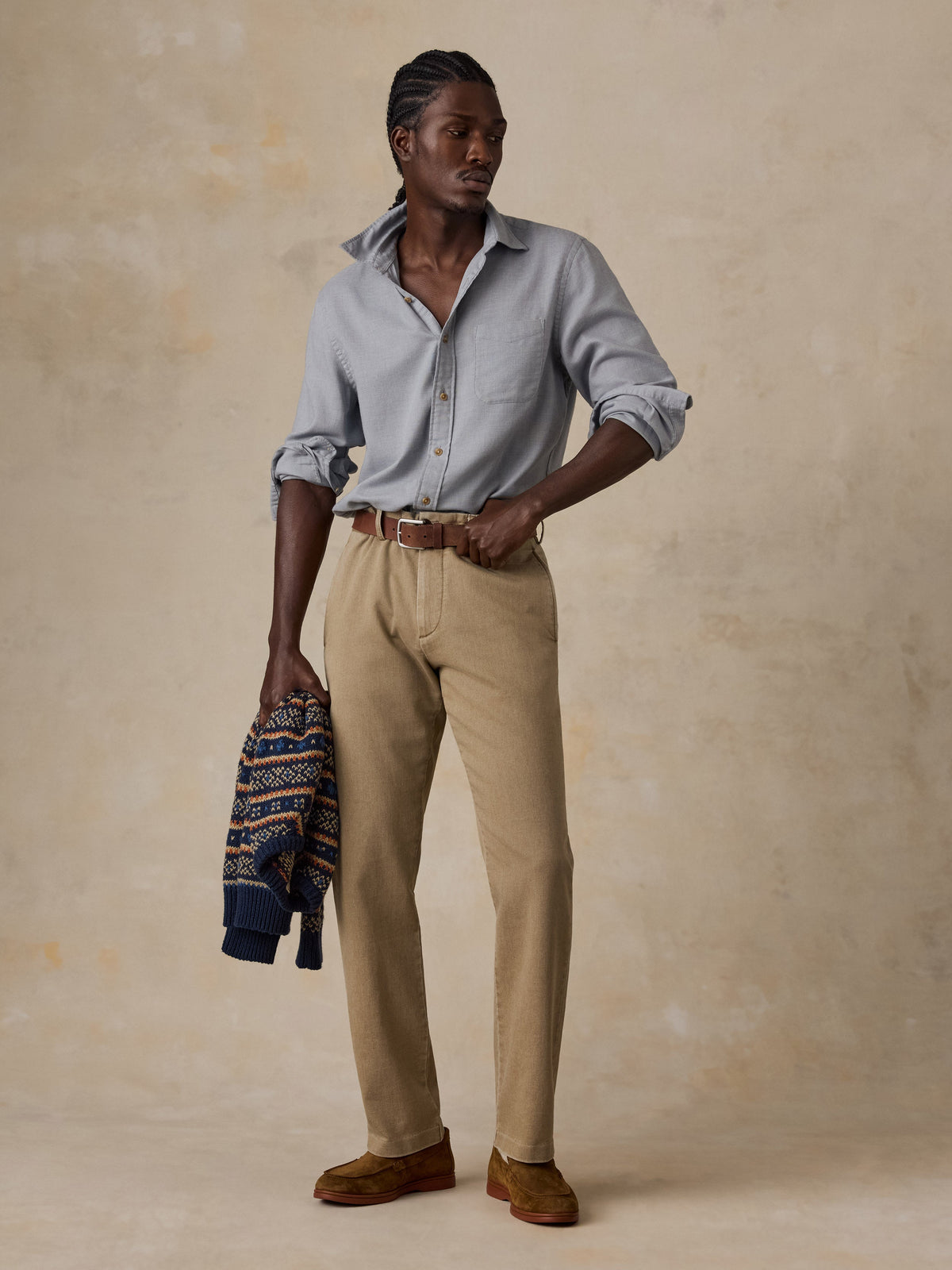 Male model wearing Faherty Timberline Brushed Twill Shirt in Mineral Grey with khaki trousers