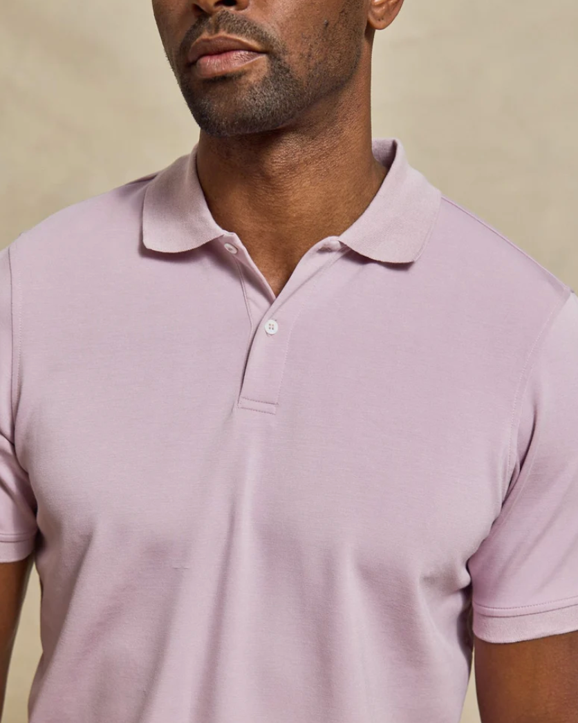 Man wearing Rye 51 The Holden SS Polo in lilac with classic collar and button placket styling.