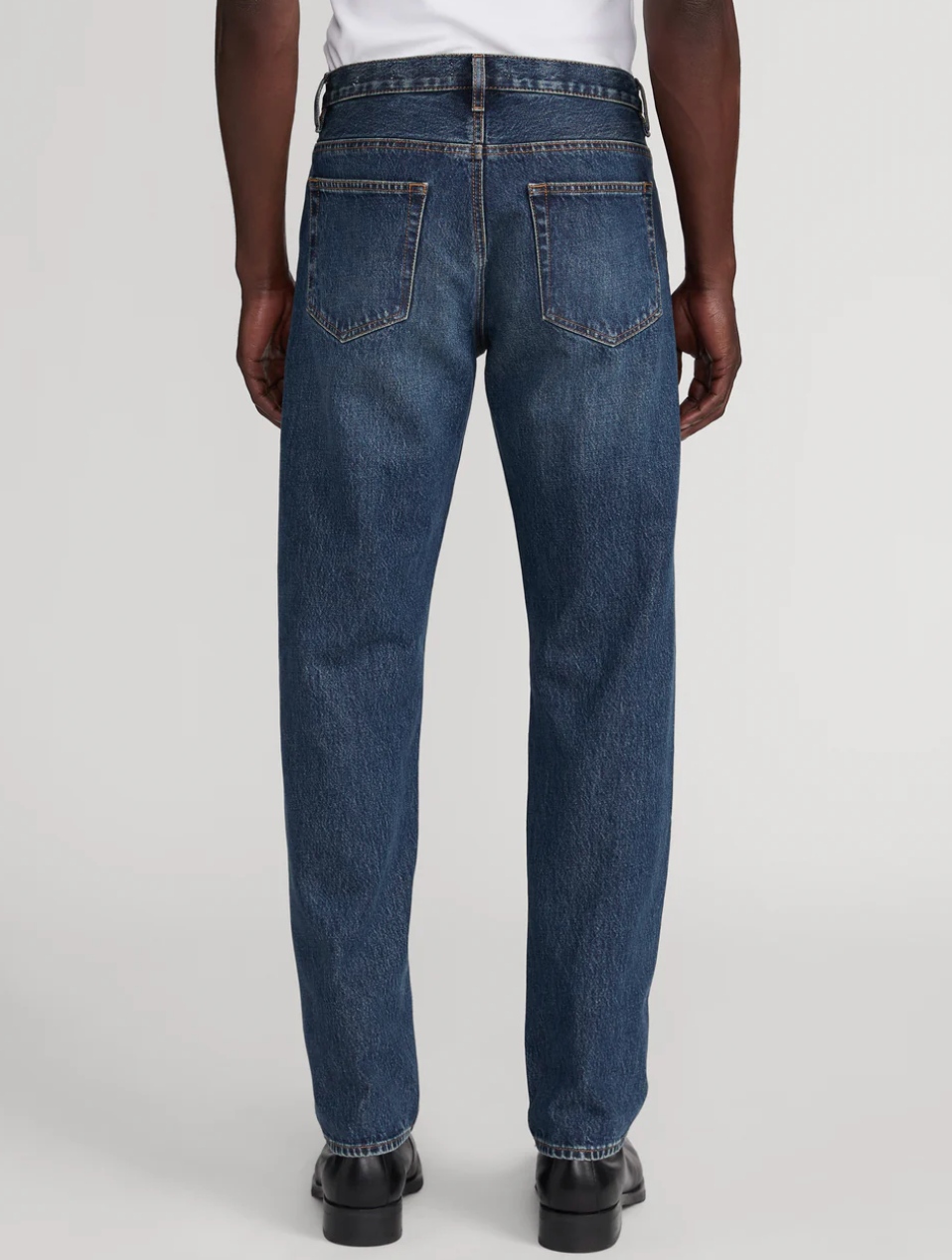 Frame The Straight Jean Strike - back view showing classic straight-leg denim jeans with traditional five-pocket styling a...