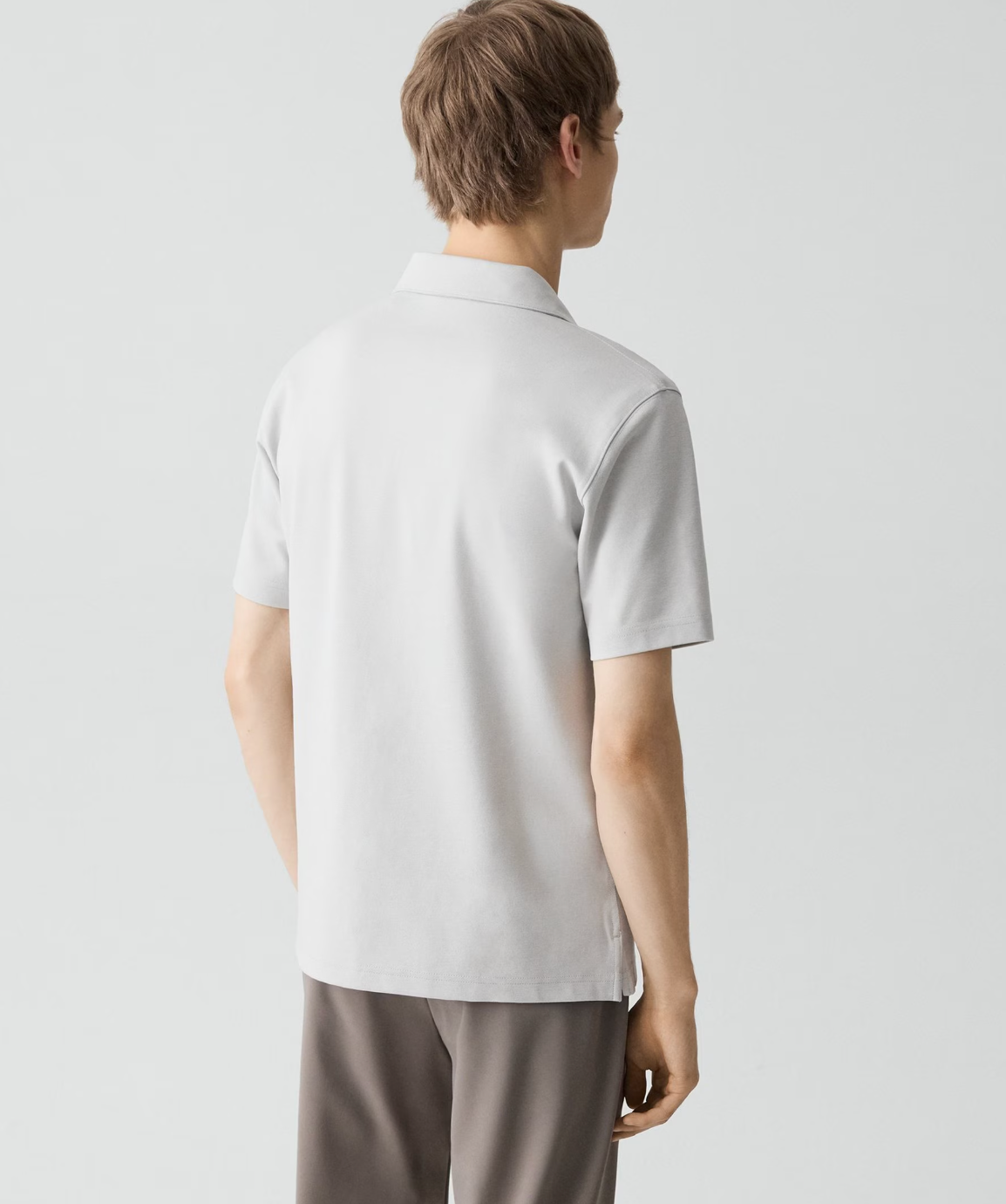 Theory Ryder Quartz men's zip polo shirt shown from back view, featuring short sleeves and collar detail.