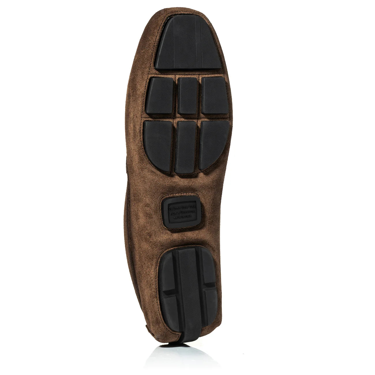 Brown suede driving moccasin sole with black rubber grip pads and textured tread pattern