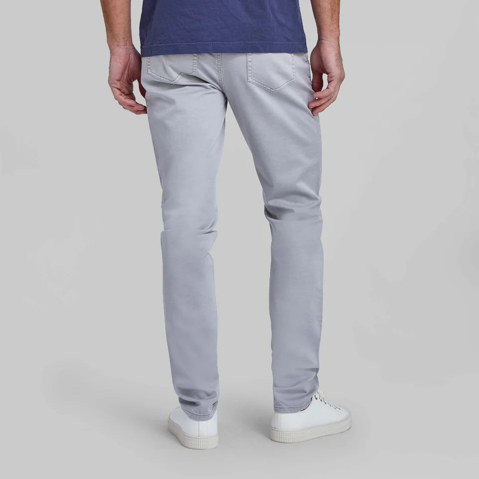 Rye 51 Flex men's light gray stretch jeans shown from behind with slim fit styling and five-pocket design.