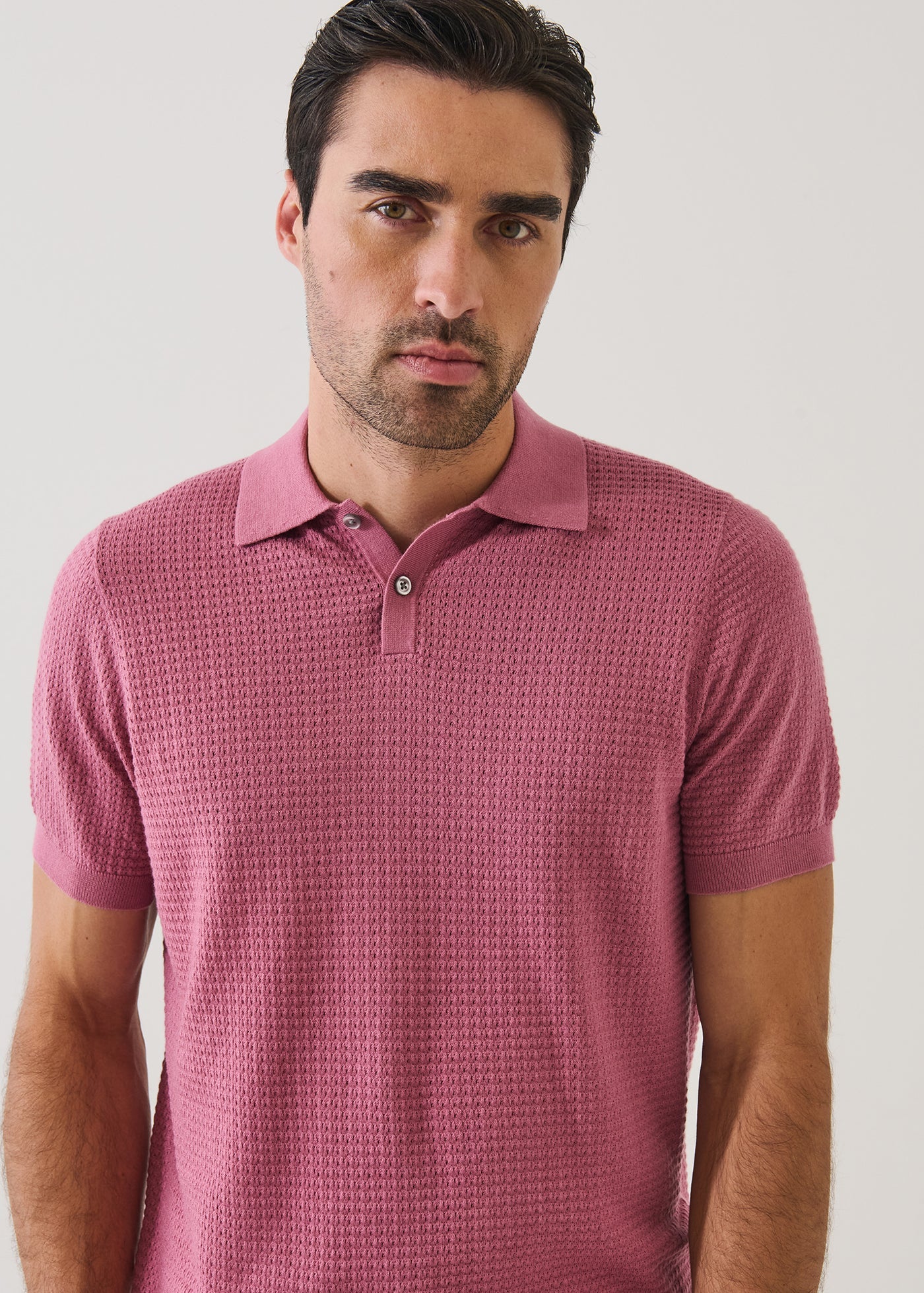 Patrick Assaraf short sleeve cotton cashmere performance stitch polo shirt in rose smoke on male model