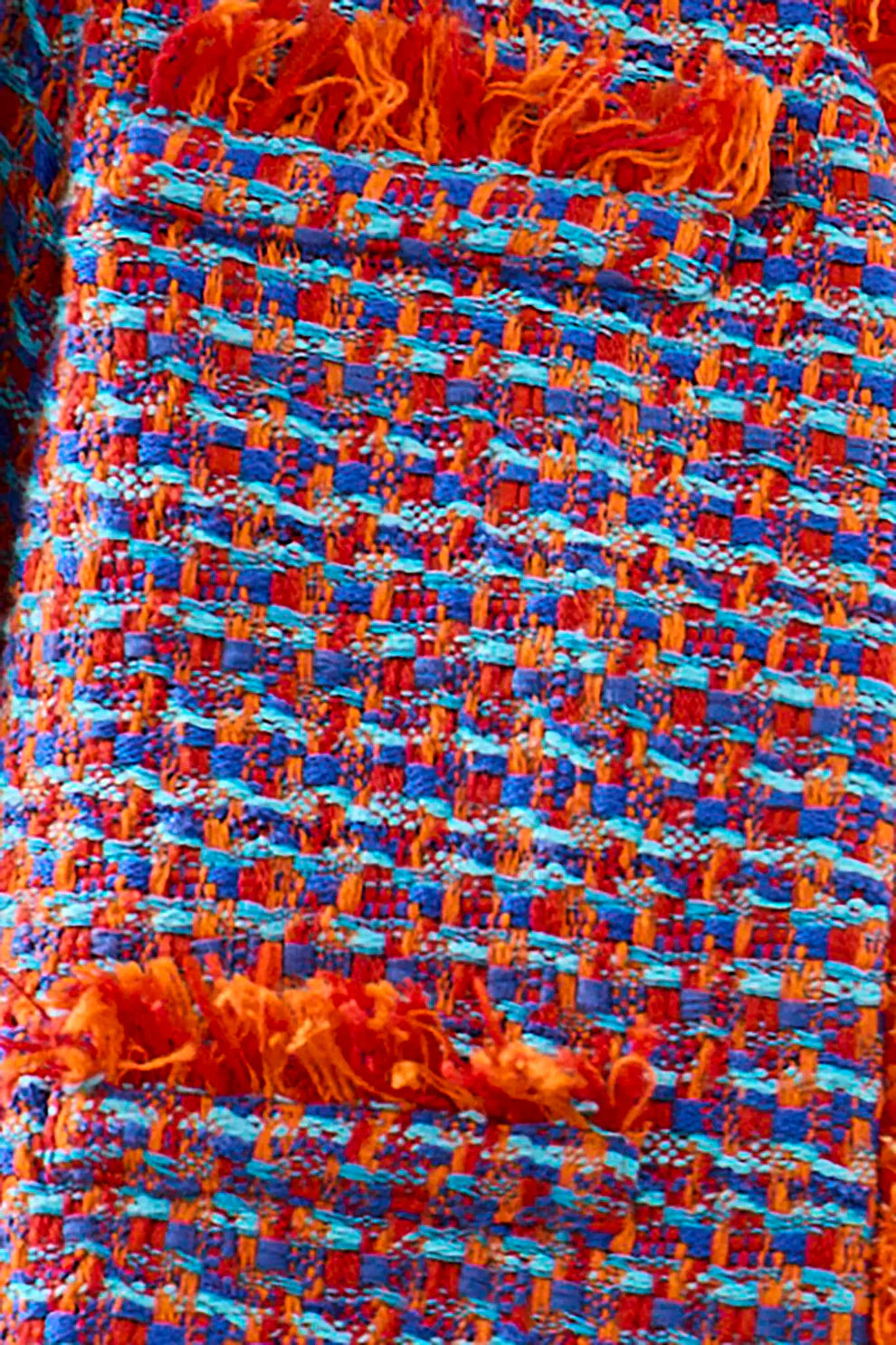 Hunter Bell Coco Jacket in vibrant mariner tweed with orange and blue woven pattern and frayed fabric details.