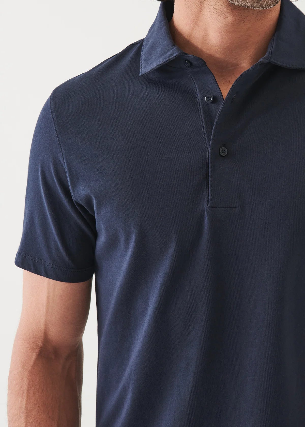 Patrick Assaraf short sleeve polo shirt in navy blue with collar and button placket