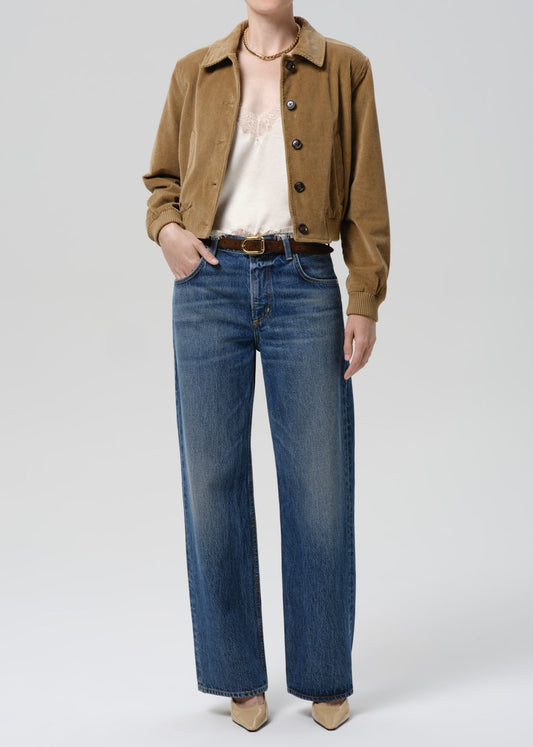 Model wearing Citizens of Humanity Lindz Easy Straight jeans in Twilight medium blue wash with wide leg