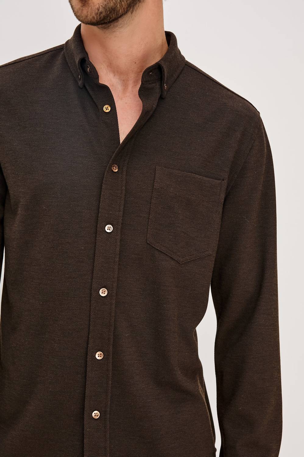 Man wearing Rails Vincent long sleeve button-down shirt in dark espresso brown with chest pocket