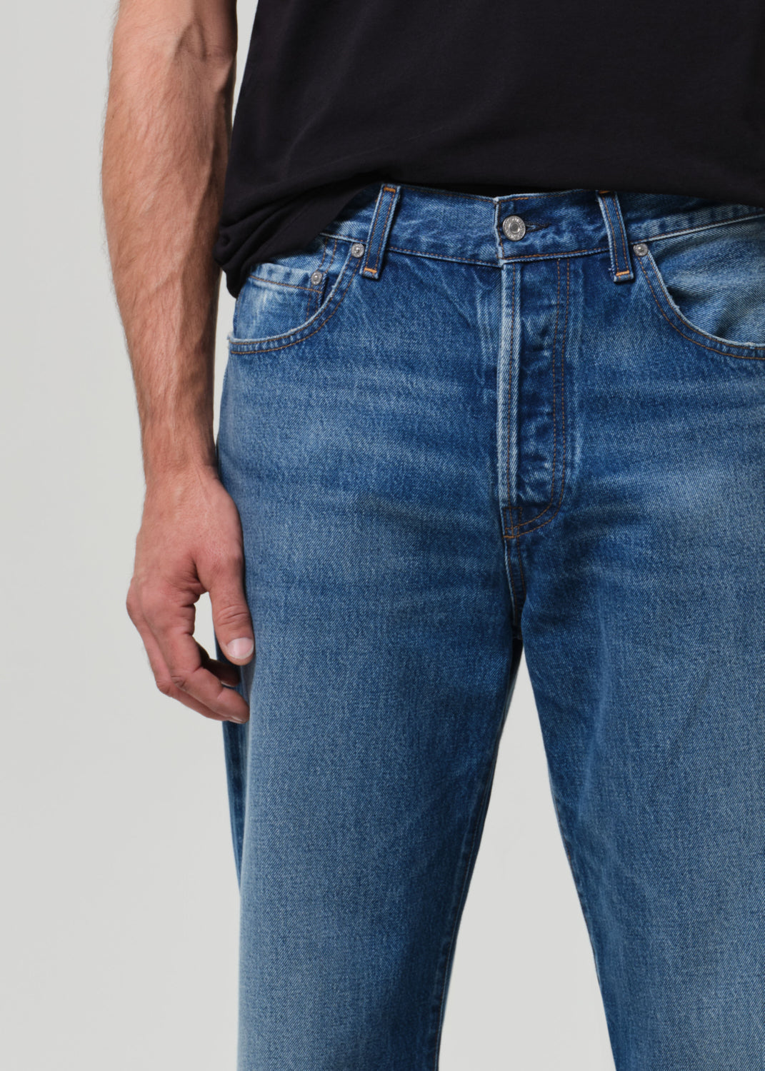 Model wearing Citizens of Humanity Beau straight jeans in mid blue denim