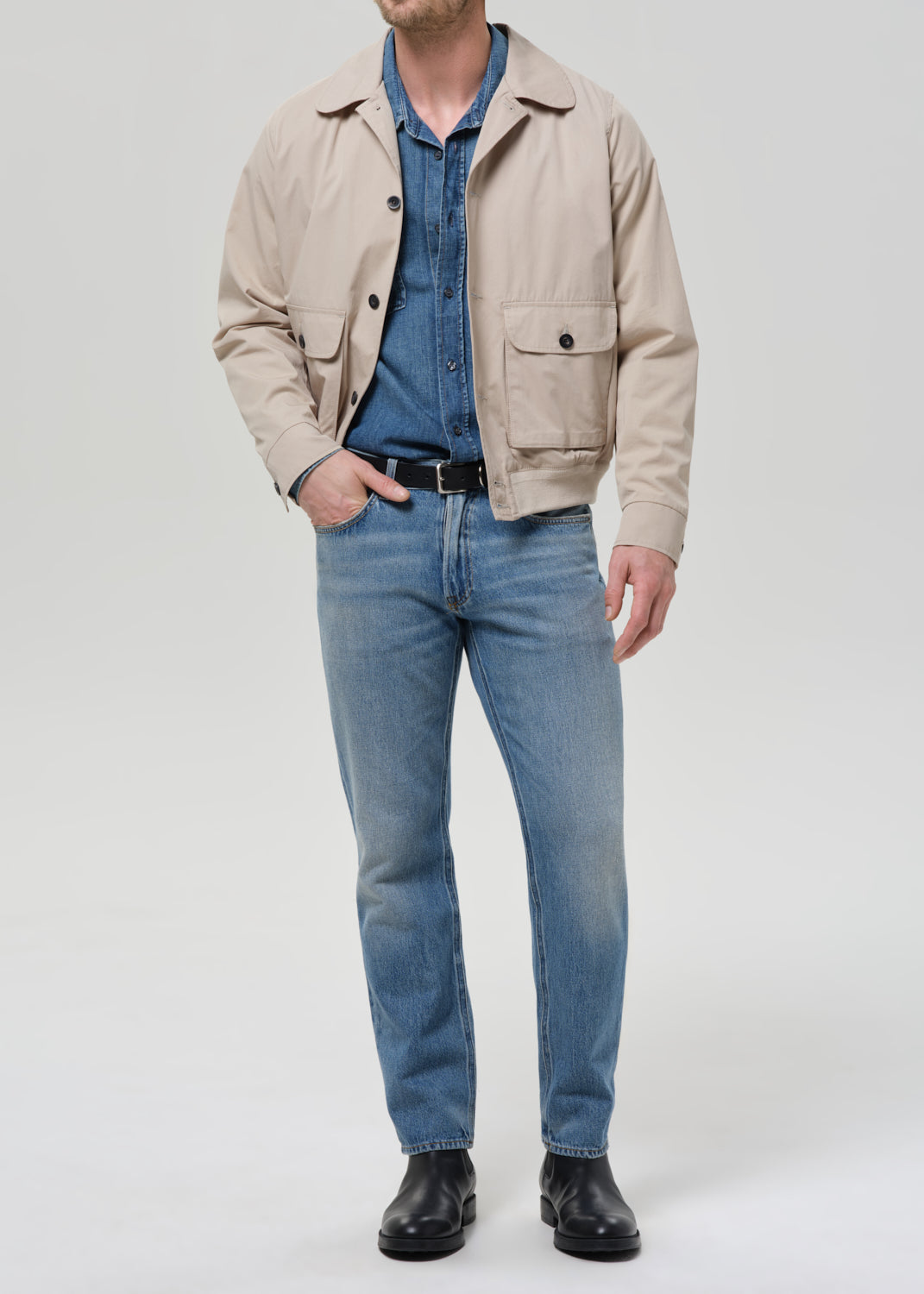 Male model wearing Citizens of Humanity Elijah straight jeans in shadow blue wash