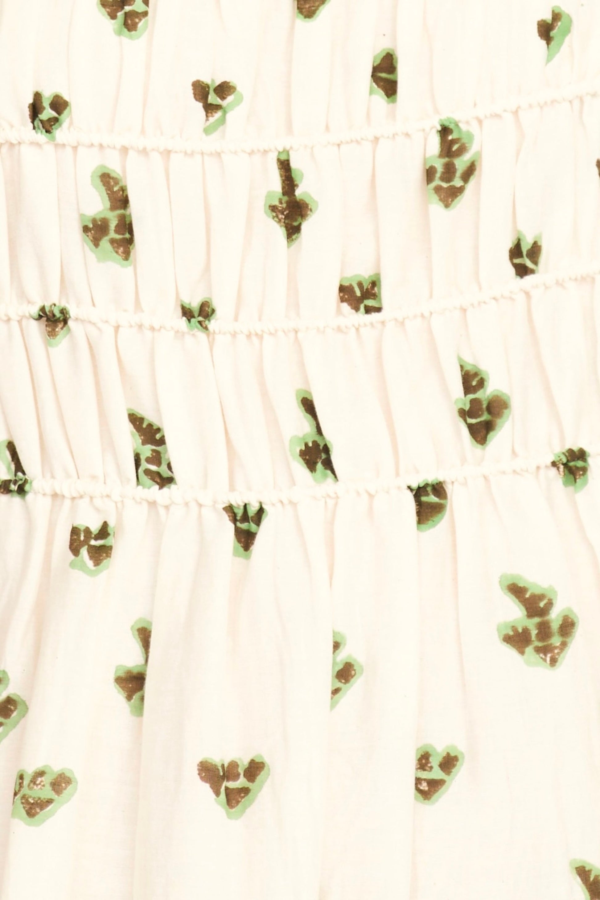 Cream colored dress with chocolate brown and mint green paisley boteh print pattern