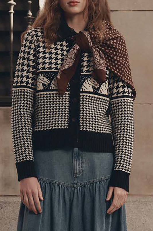 Model wearing black and cream houndstooth pony jacquard cardigan with denim skirt and scarf