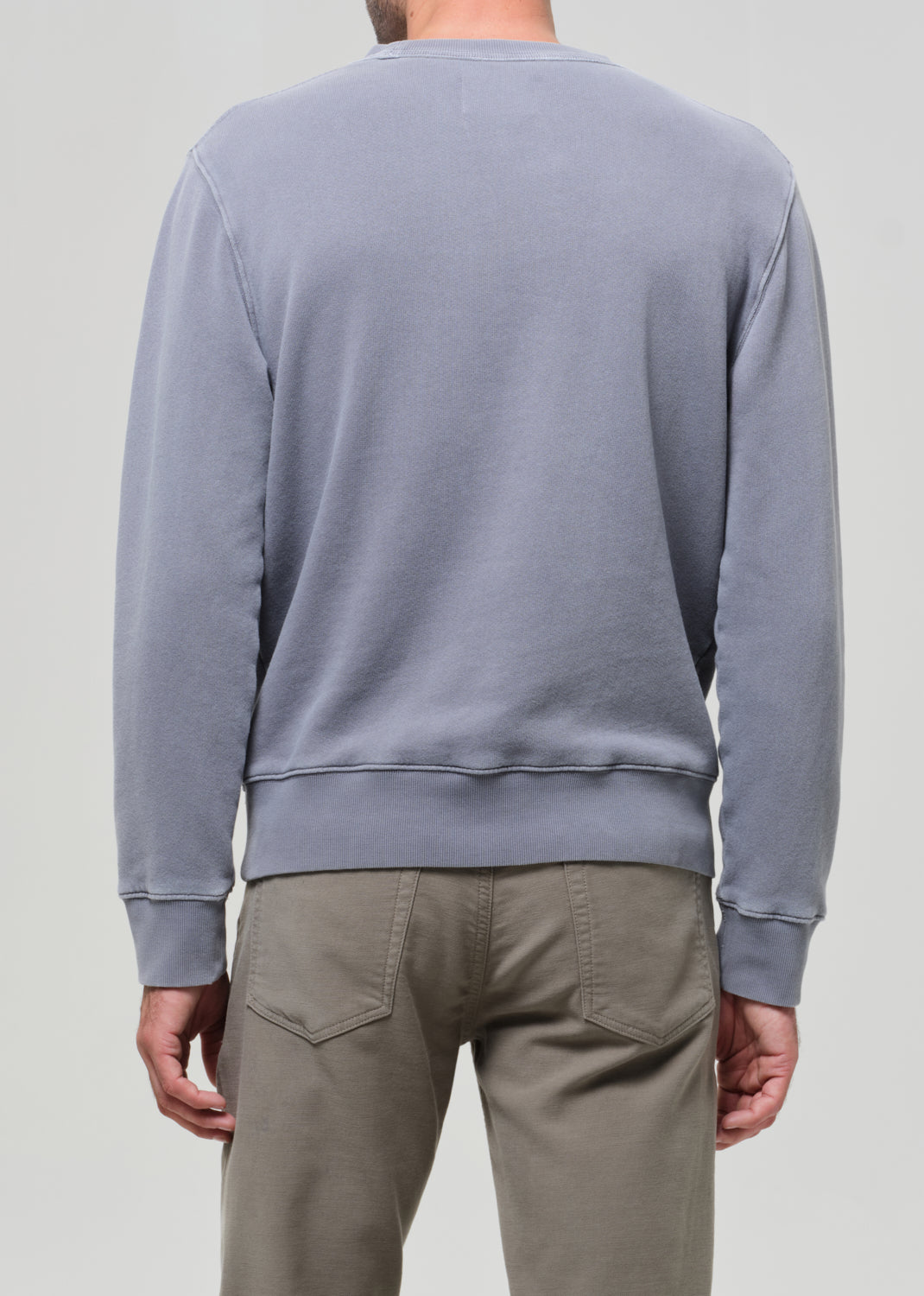 Back view of man wearing Citizens of Humanity Vintage Crewneck Sweatshirt in Heron Grey