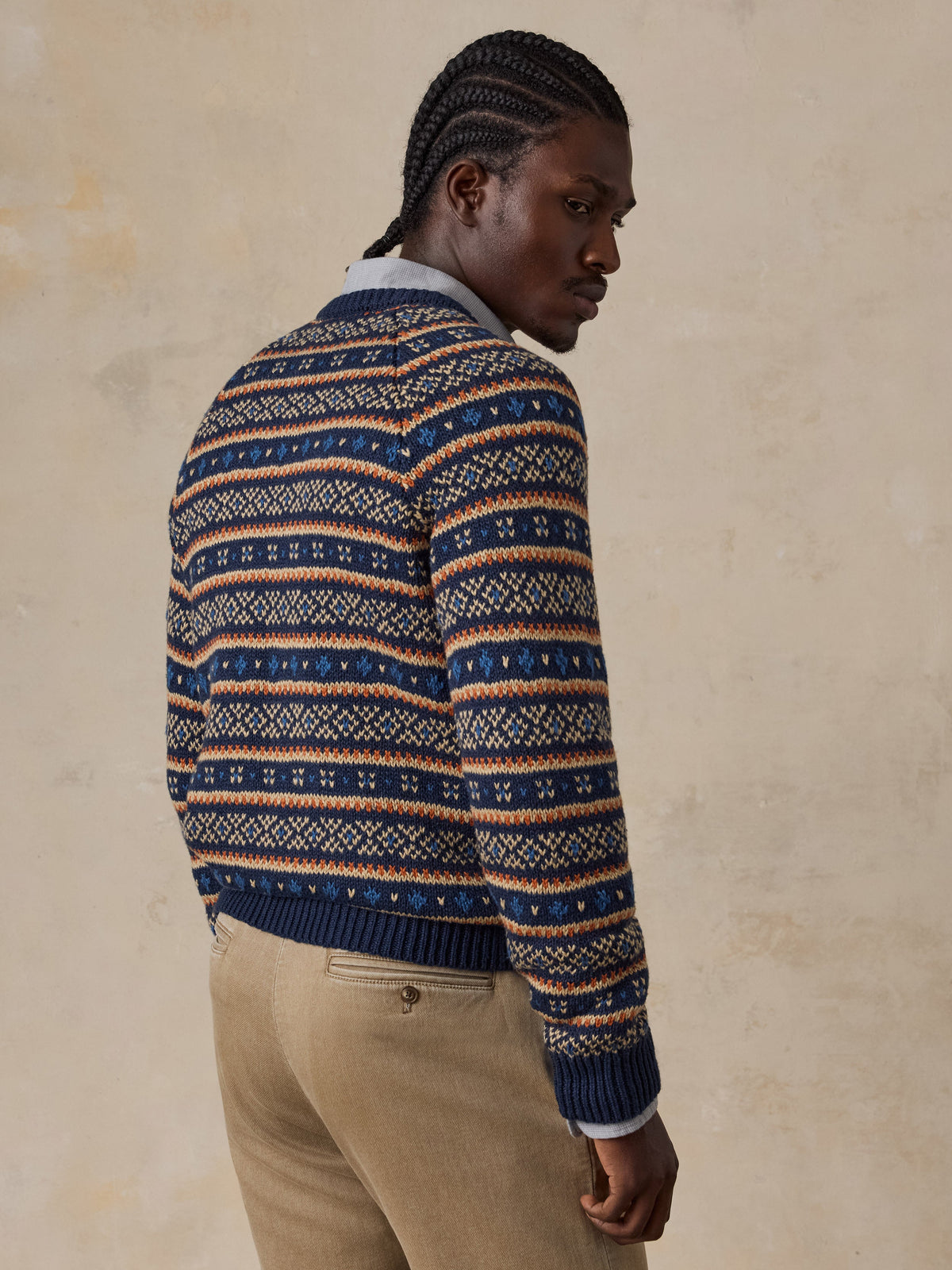 Model wearing Faherty Nordic Sweater Crew in Northern Nights Fairisle pattern, back view