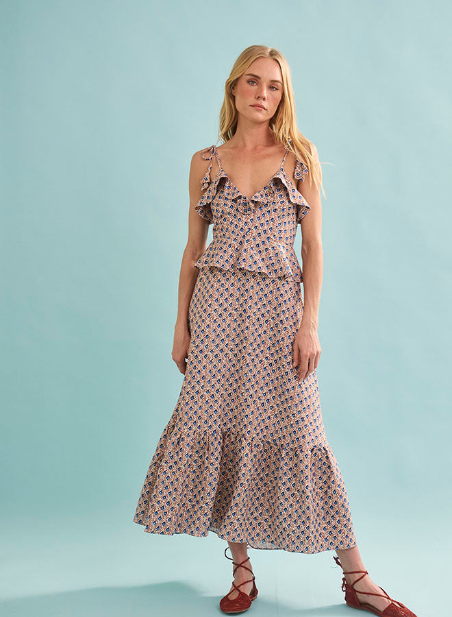 Woman wearing Hunter Bell Jamison dress in berryvine print with ruffles and tie straps