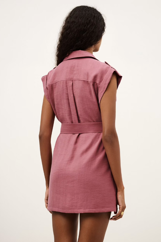 Woman wearing ba&sh Dial sleeveless shirt dress with collar and belt tie, shown from behind.