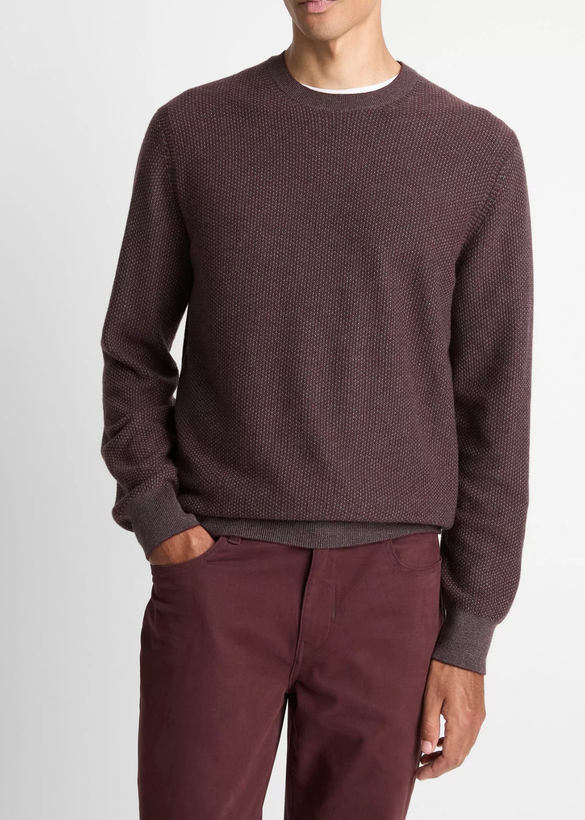 Vince men's long sleeve crew neck sweater with geometric jacquard pattern worn with burgundy pants