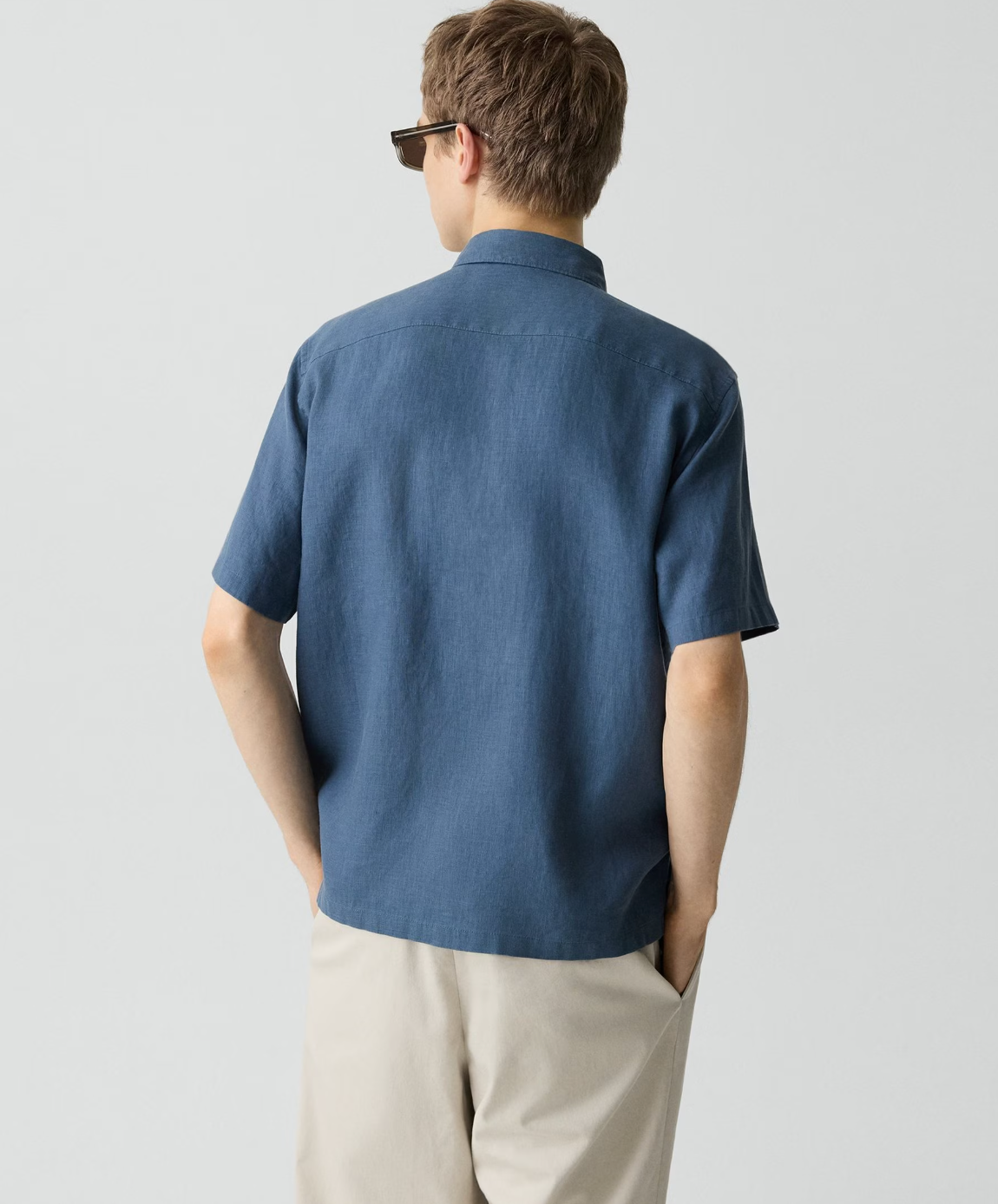 Theory Irving short sleeve shirt shown from behind, featuring a relaxed fit and casual collar styling.