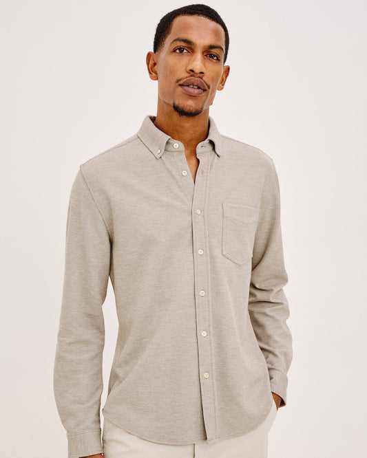 Male model wearing Rails Vincent long sleeve button-down shirt in silt beige