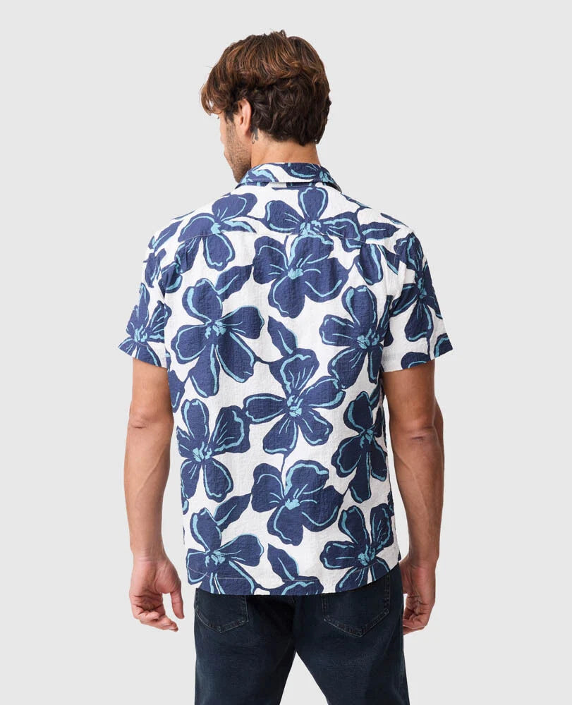 Rodd & Gunn Hamilton Bay short sleeve shirt with blue floral print on white background, shown from behind