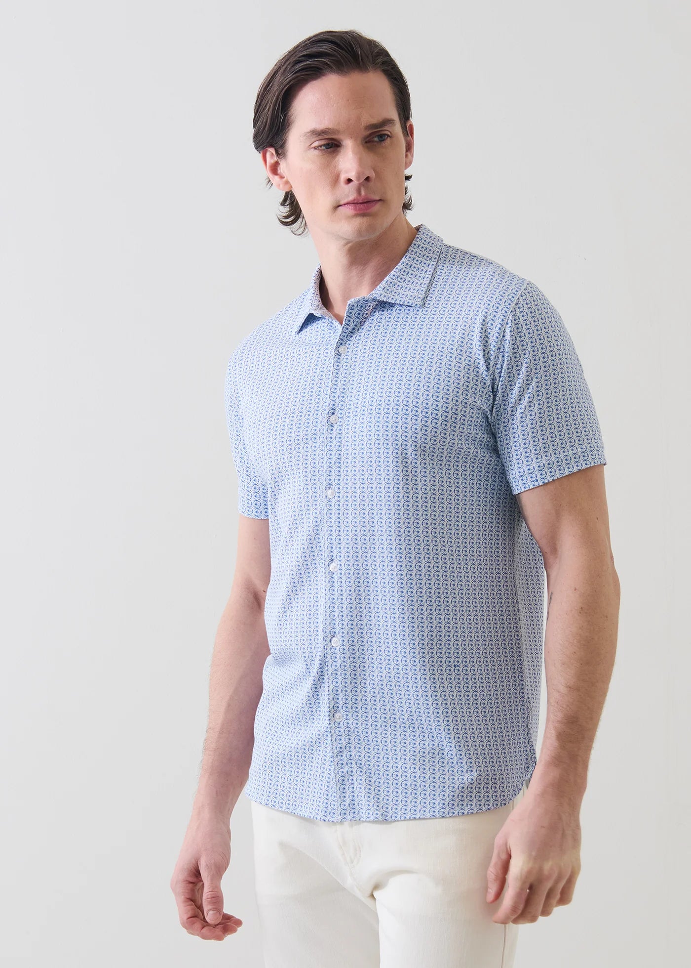 Patrick Assaraf short sleeve button-up shirt featuring mini geometric print pattern in light blue tones