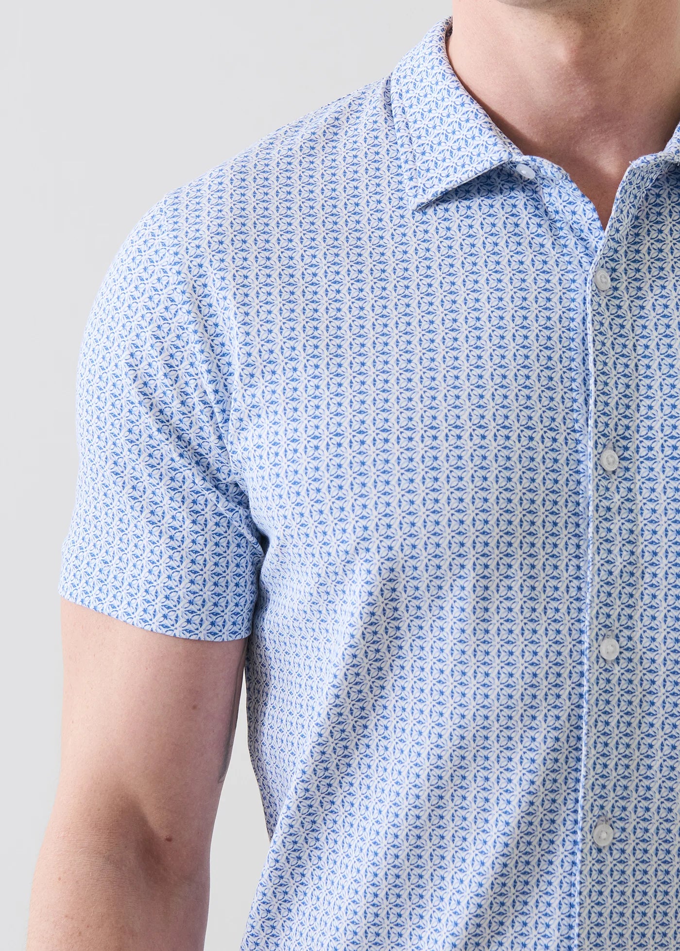 Patrick Assaraf short sleeve shirt featuring blue and white mini geometric print pattern with button front closure.