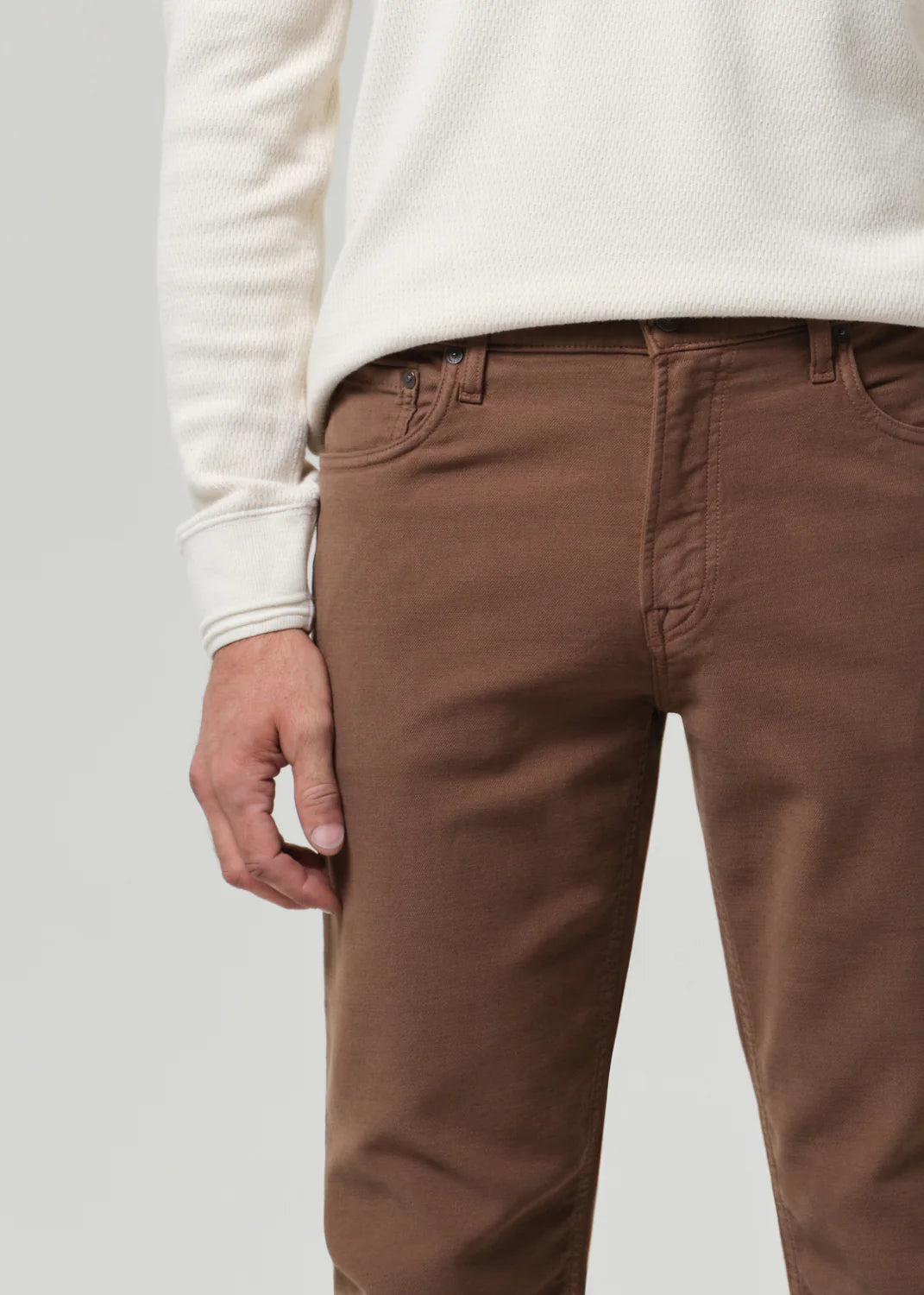 Citizens of Humanity Adler jeans in brown French terry fabric, showing front view with classic five-pocket styling.