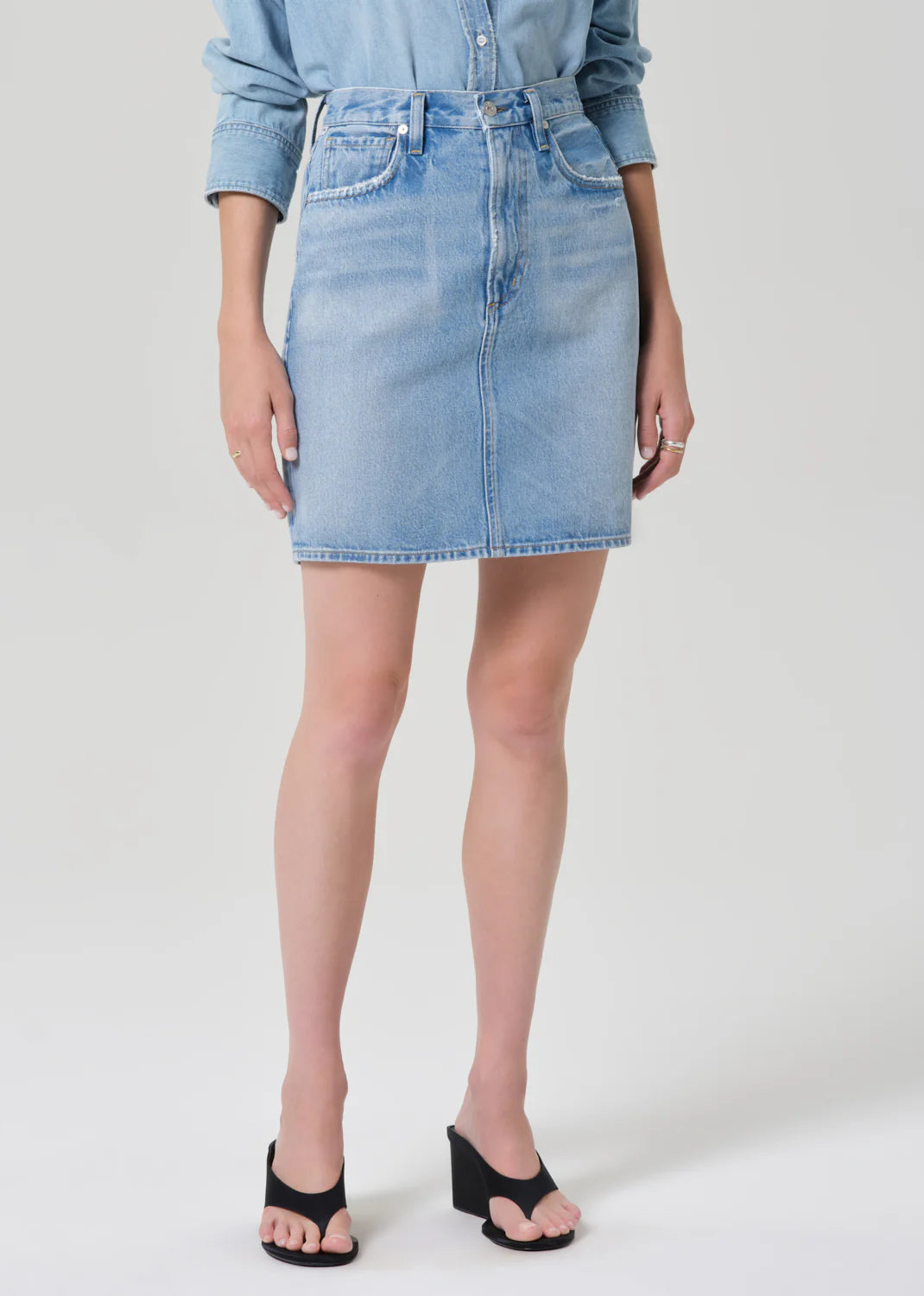 Citizens of Humanity Etta Pencil Skirt in light wash denim with classic five-pocket styling and fitted silhouette.