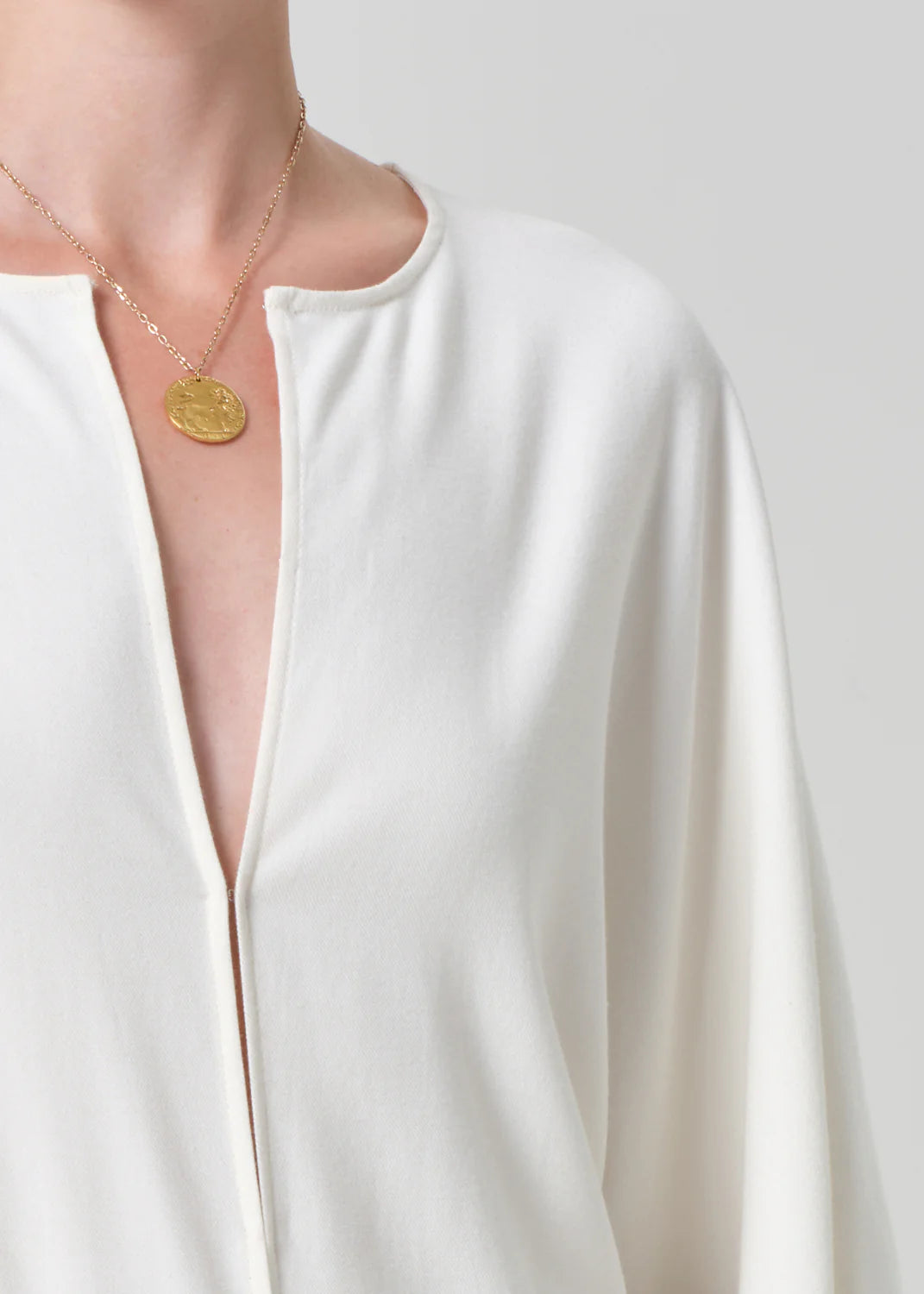 Citizens of Humanity France Shirt in white cotton twill featuring an open collar and relaxed fit, styled with a gold coin ...