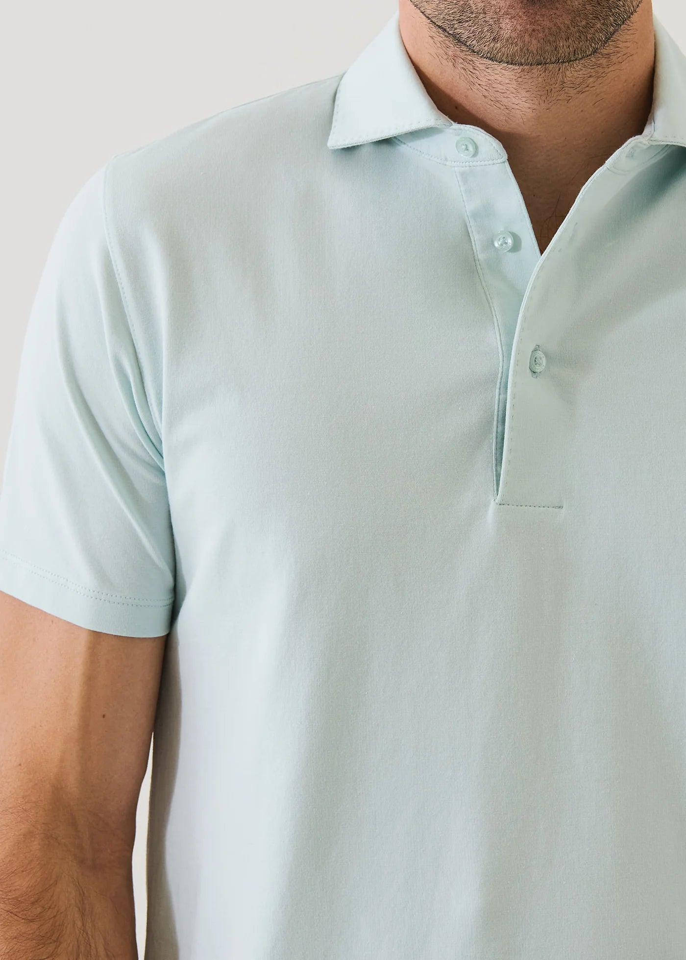 Patrick Assaraf short-sleeve light green pima cotton polo shirt with collar and button placket detail.