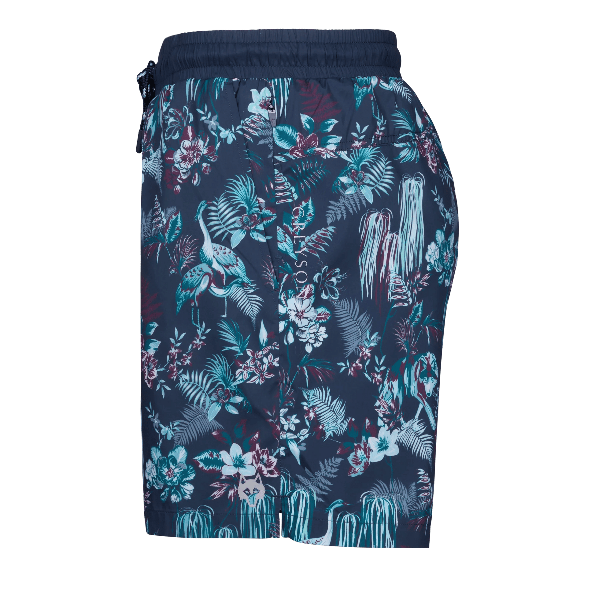 Navy swim shorts with tropical floral pattern featuring palm leaves and hibiscus flowers