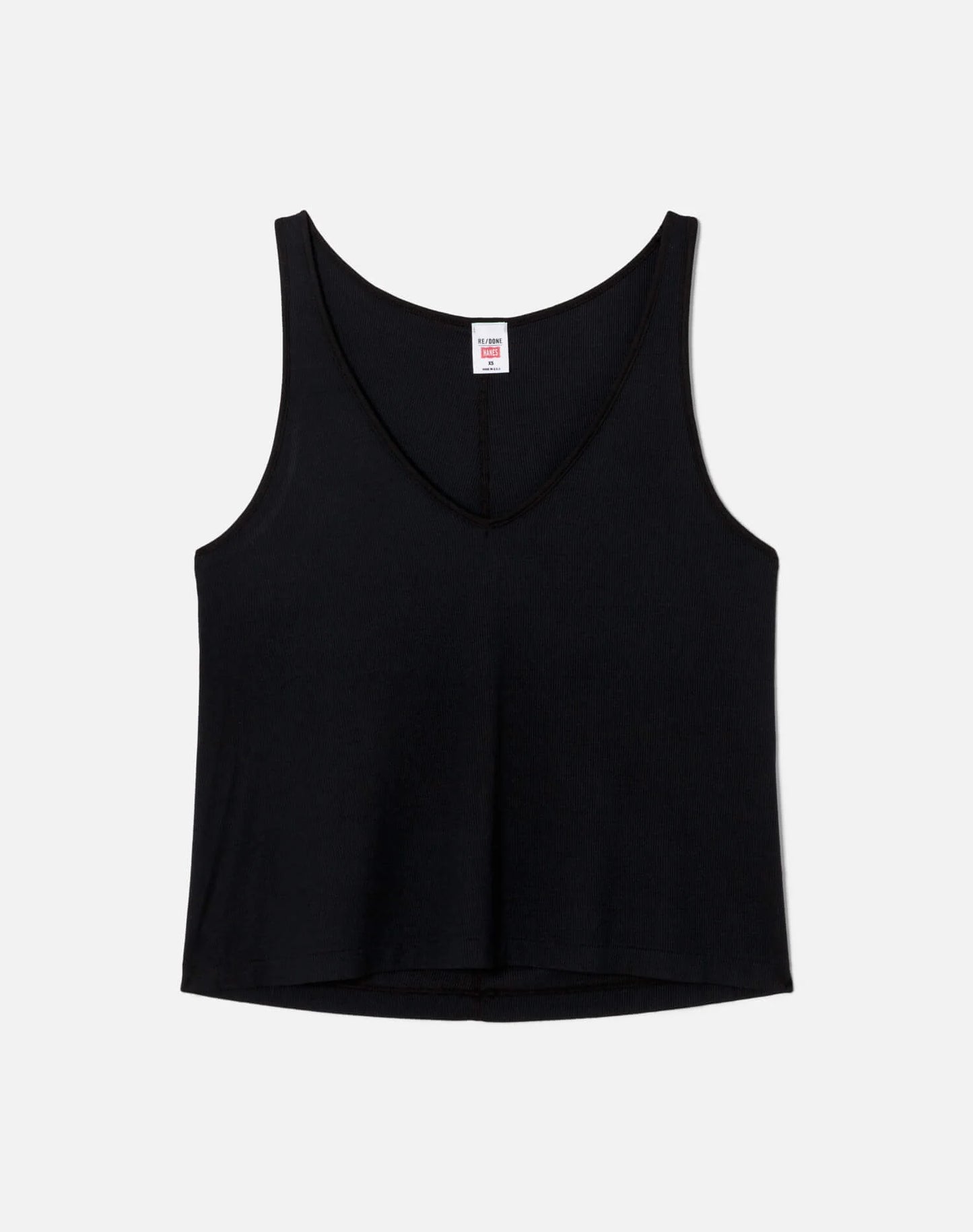 Re/Done black ribbed tank top with deep V-neck and sleeveless design on white background