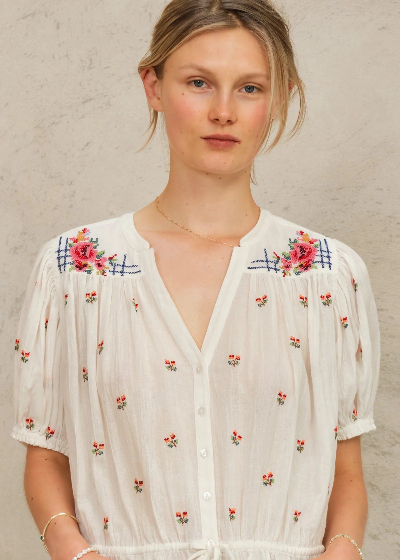 MABE Harlie embroidered short sleeve white blouse with floral pattern and gathered neckline details