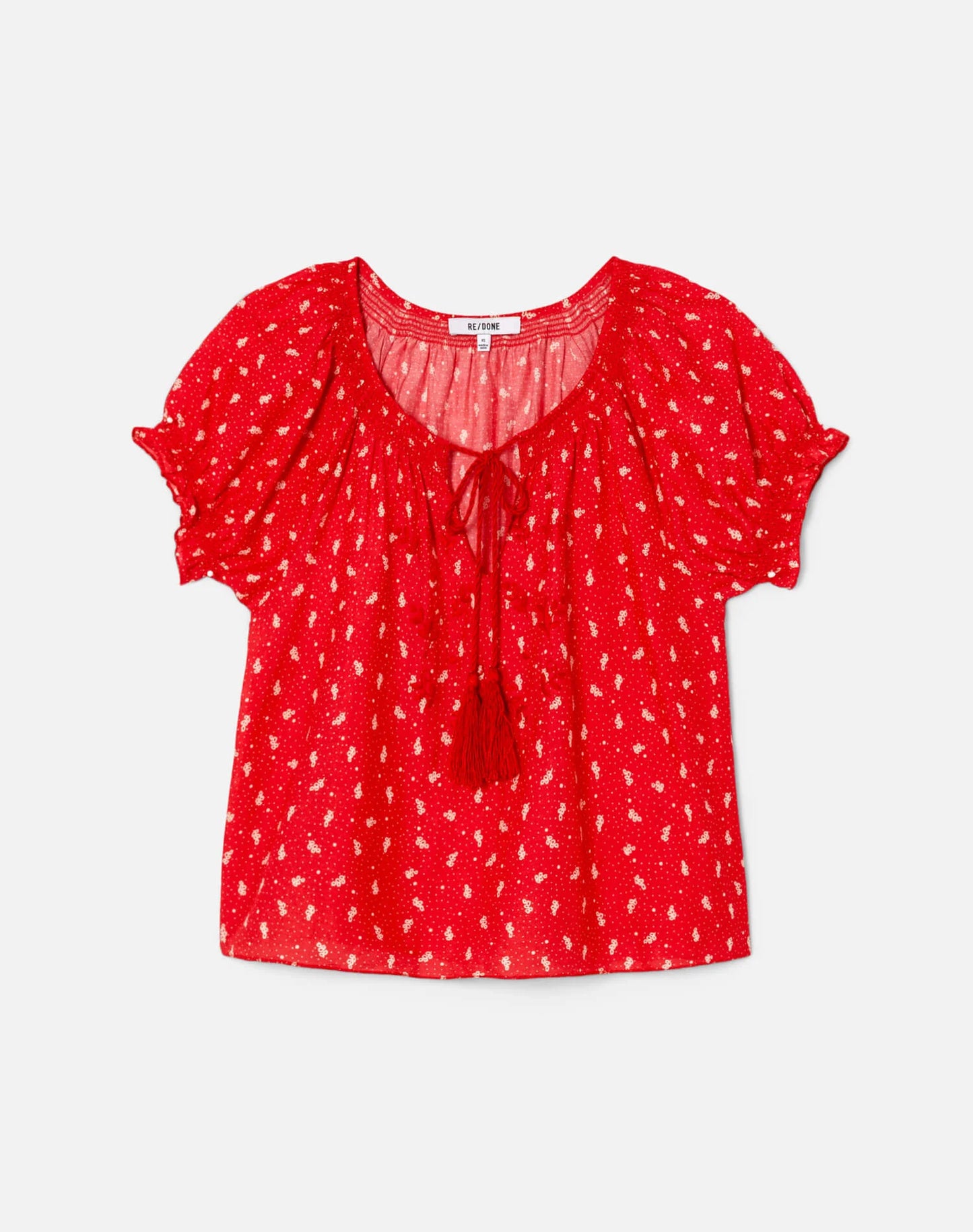 Red floral embroidered peasant blouse with ruffled short sleeves and tie-front neckline from Re/Done.