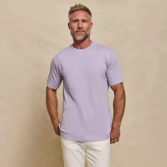 Rye 51 The Luxe Supima short sleeve crewneck t-shirt in lavender worn by bearded man against neutral background