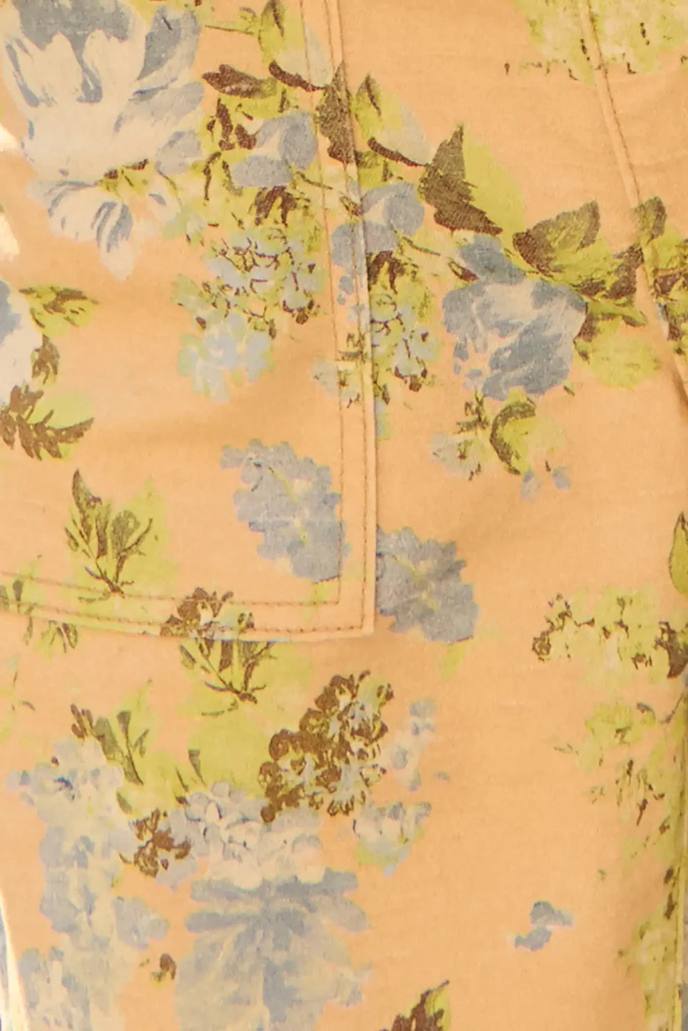 Hunter Bell Mallory jeans featuring an all-over floral print pattern with roses and botanical elements on fabric.