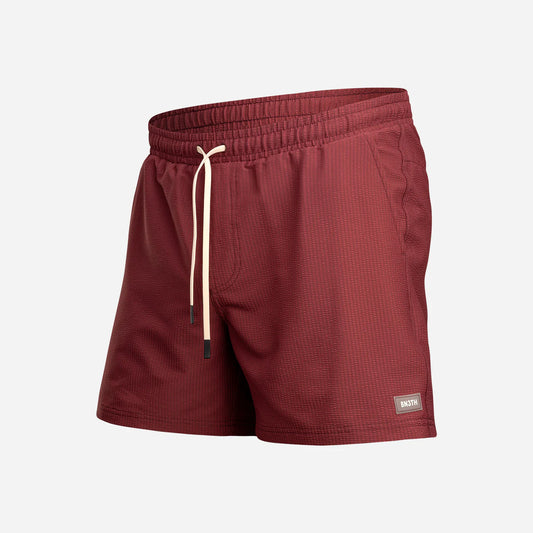 BN3TH Agua Wave swim trunks in red mahogany with drawstring waistband and brand label