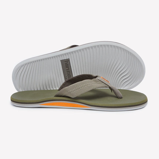Hari Mari Dunes moss green flip flops with textured fabric straps and white ridged sole, shown from side angle.