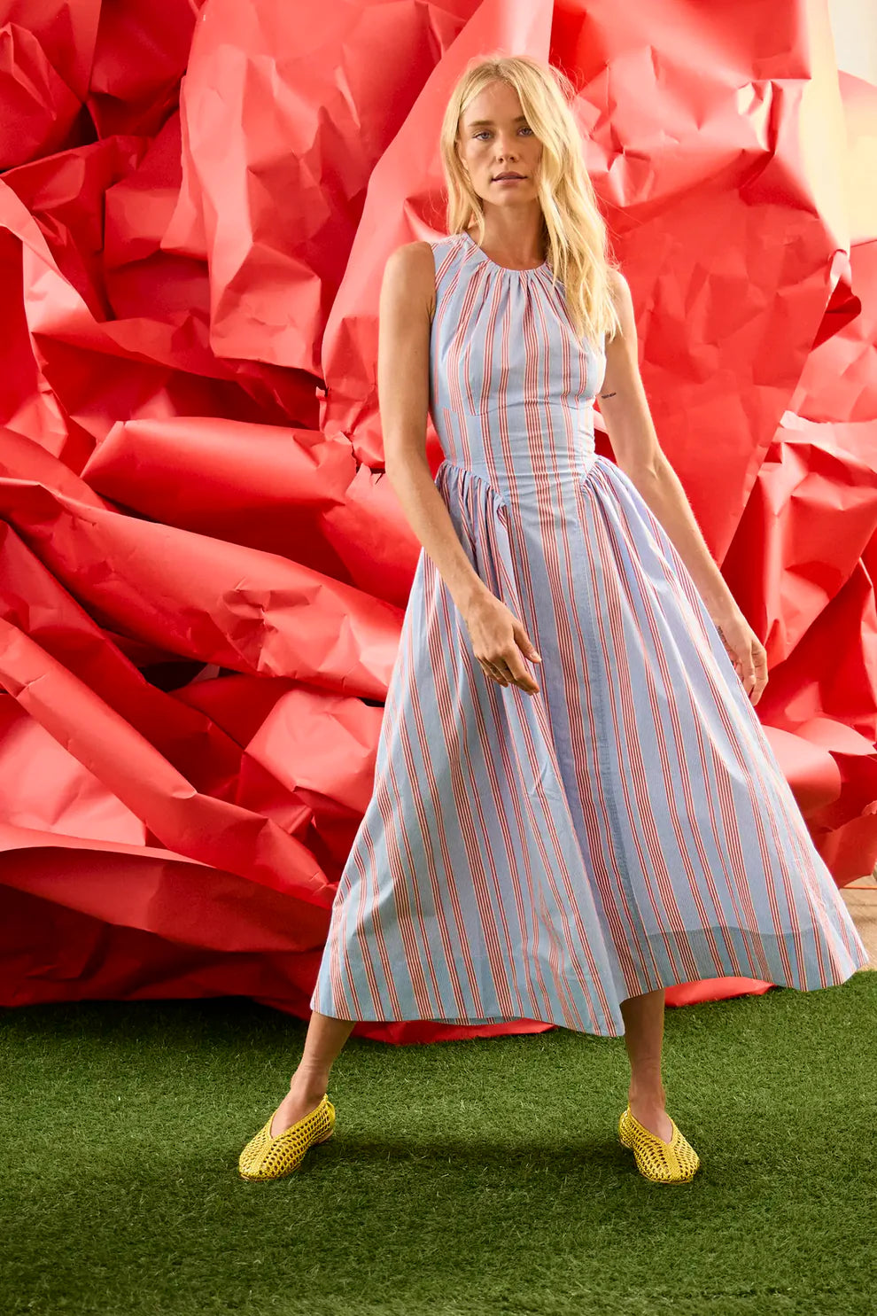 Hunter Bell Nantucket sleeveless maxi dress with vertical stripes, featuring a fitted bodice and flowing skirt silhouette.
