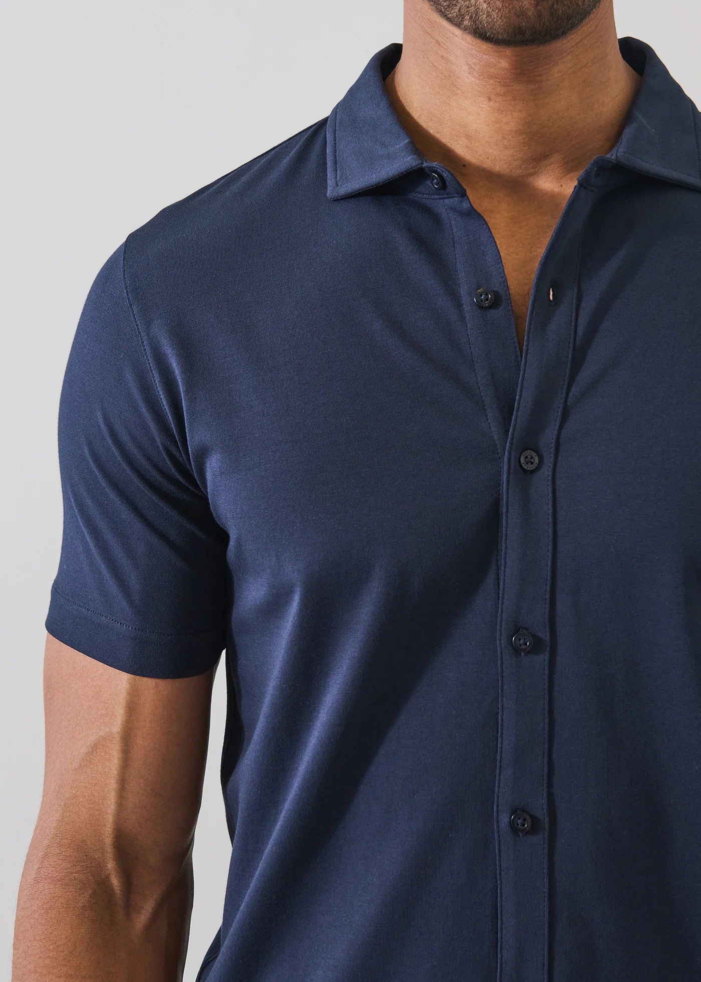 Patrick Assaraf short-sleeve button-up shirt in navy blue with collar and front button closure