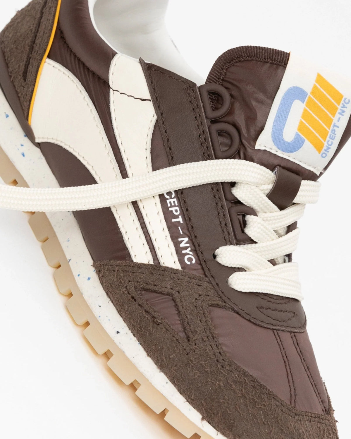 Oncept Toronto men's sneaker in espresso brown with cream laces and retro sole