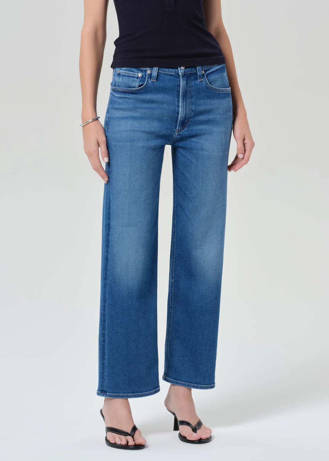 Citizens of Humanity Palma straight-leg jeans in medium wash denim with wide-leg silhouette on model