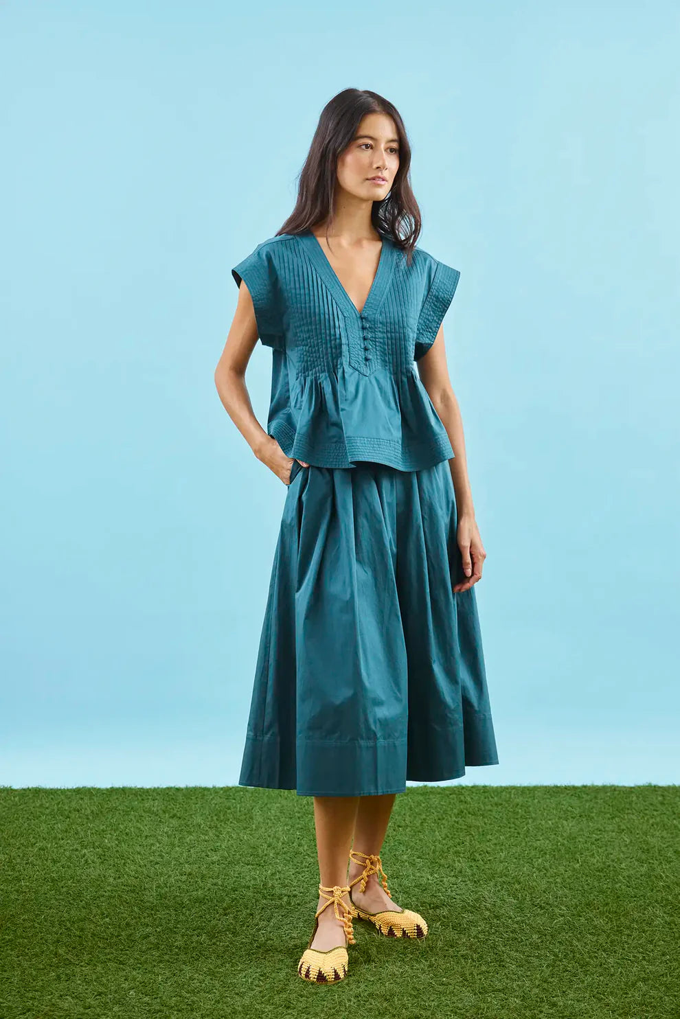 Hunter Bell Maison petrol green midi skirt with full A-line silhouette and high waistband, styled with matching top.