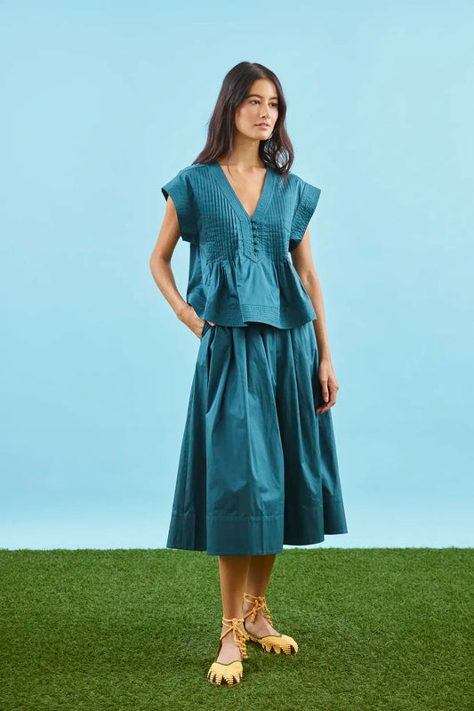 Hunter Bell Maison petrol green midi skirt with full A-line silhouette and high waistband, styled with matching top.