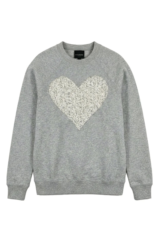 Grey crewneck sweatshirt with sparkly white heart design on front by Le Superbe