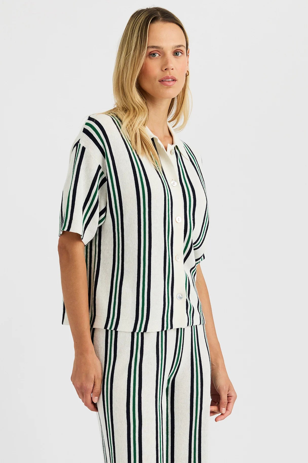 One Grey Day Rafa Shirt featuring vertical stripe pattern with button-front closure and short sleeves on model