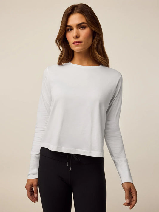 Greyson long-sleeve Sloane top in white featuring a relaxed fit and crew neckline on model
