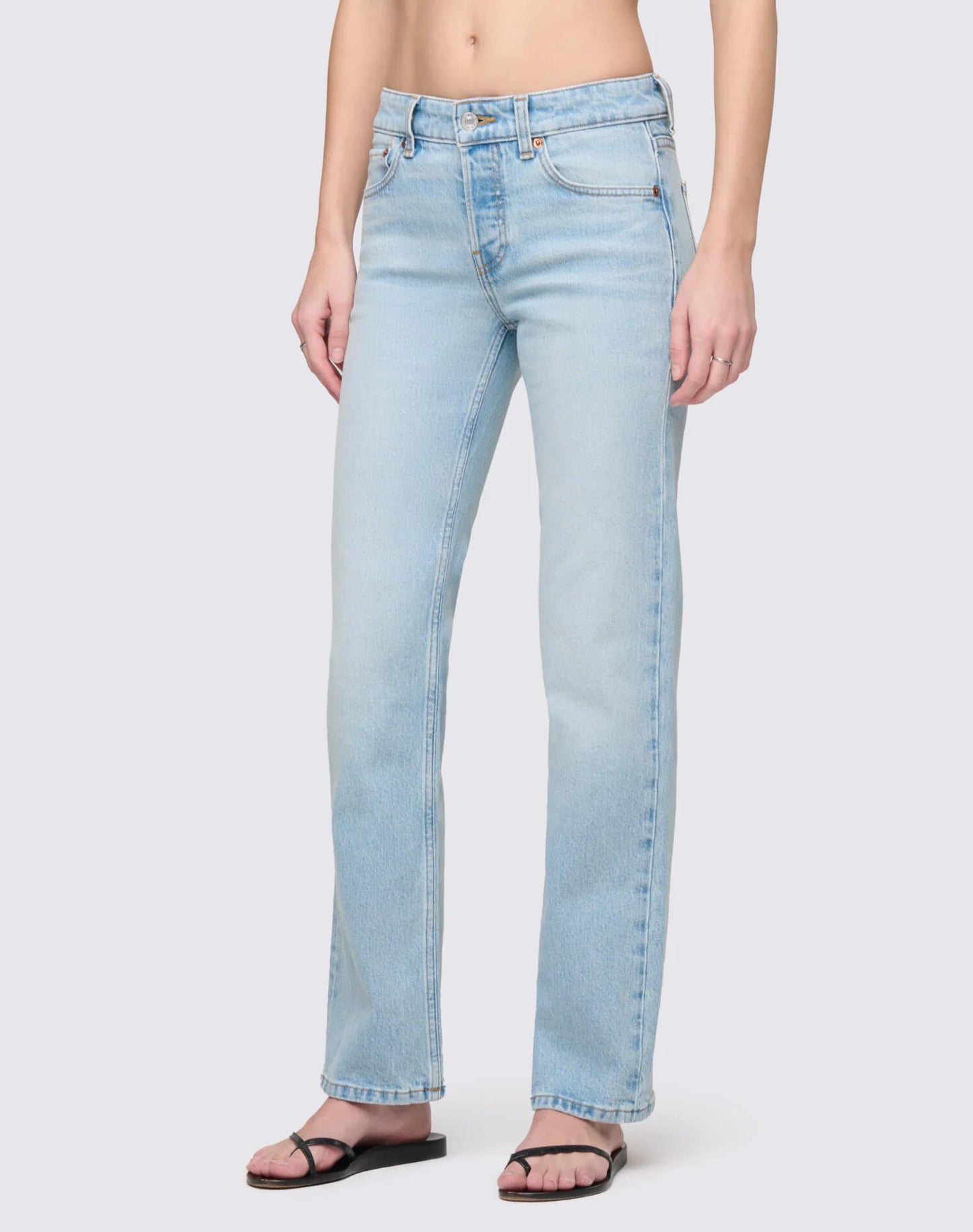 Re/Done slim straight crop jeans in light wash denim with classic five-pocket styling and straight leg silhouette.