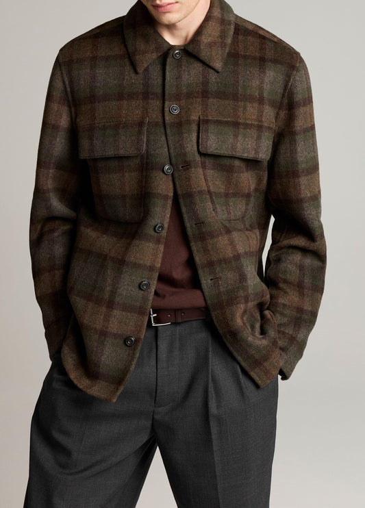 Male model wearing olive brown plaid wool-blend shirt jacket with chest pockets