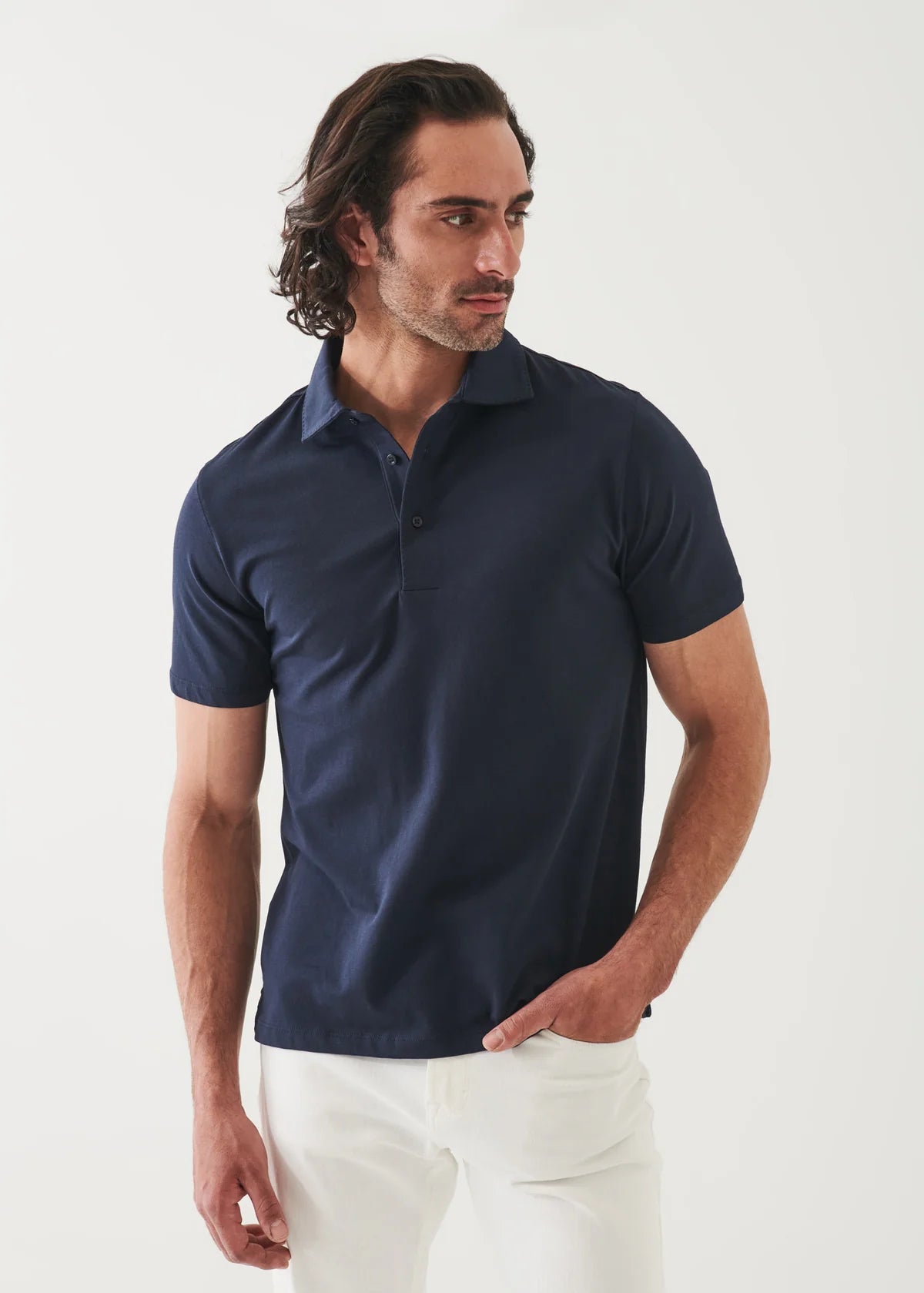 Patrick Assaraf men's short sleeve polo shirt in navy blue with classic collar and button placket.